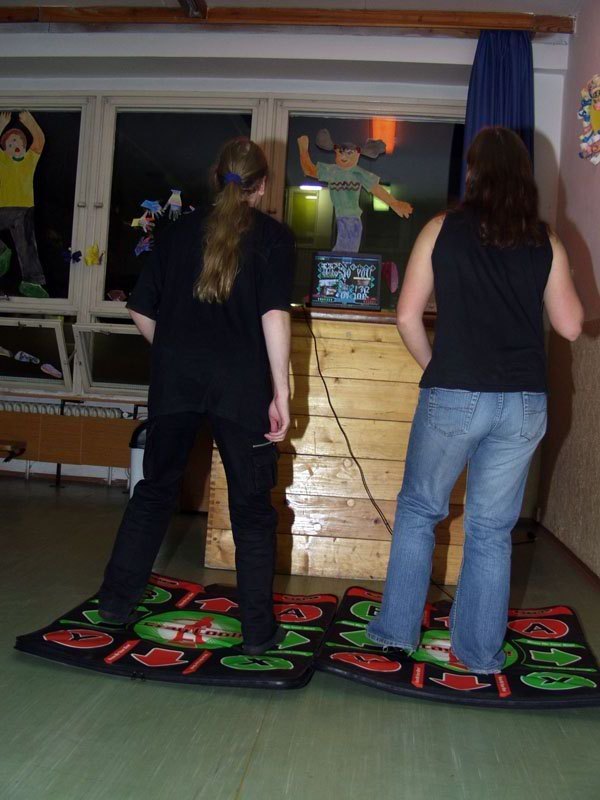 Two people dance side by side at a youth center demo in the Czech Republic